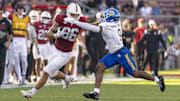 Sep 27, 2025; Stanford, California, USA;  Stanford Cardinal tight end Sam Roush (86) stiff arms San Jose State Spartans linebacker Noah McNeal-Franklin (9) during the first quarter at Stanford Stadium. Mandatory Credit: Stan Szeto-Imagn Image