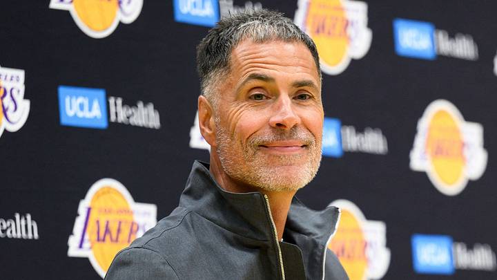 Sep 25, 2025; El Segundo, CA, USA; Los Angeles Lakers general manager Rob Pelinka, left, speaks during a press conference to preview the 2025-26 season at UCLA Health Training Center. Mandatory Credit: William Liang-Imagn Images