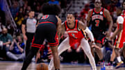 Oct 23, 2024; New Orleans, Louisiana, USA;  New Orleans Pelicans guard Dejounte Murray (5) guards Chicago Bulls guard Coby White (0) during the second half at Smoothie King Center. 