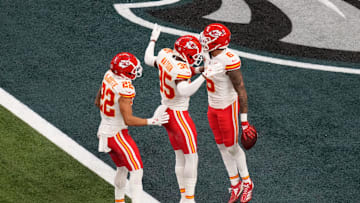 Feb 9, 2025; New Orleans, LA, USA; Kansas City Chiefs safety Bryan Cook (6) reacts with cornerback Jaylen Watson (35) and cornerback Trent McDuffie (22) after an interception during the second quarter in Super Bowl LIX  against the Philadelphia Eagles at Caesars Superdome. Mandatory Credit: Kirby Lee-Imagn Images
