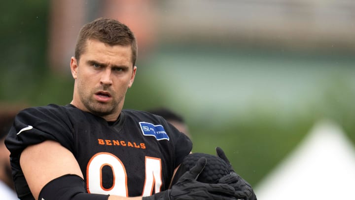 Cincinnati Bengals defensive end Sam Hubbard (94) stretches at Cincinnati Bengals training camp on the Kettering Health Practice Fields in Cincinnati on Sunday, July 28, 2024.