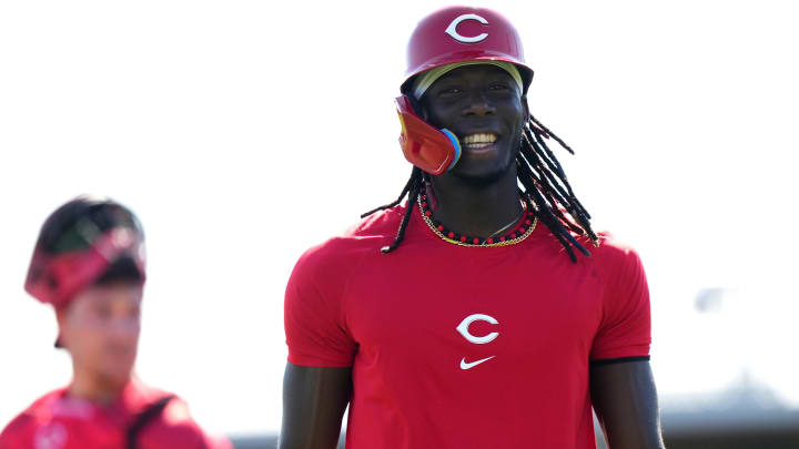 Cincinnati Reds shortstop Elly De La Cruz smiles during live batting practice during spring training workouts, Saturday, Feb. 17, 2024, at the team's spring training facility in Goodyear, Ariz.