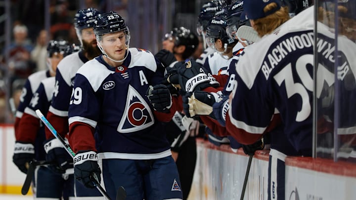 Dec 13, 2025; Denver, Colorado, USA; Colorado Avalanche center Nathan MacKinnon (29) celebrates with the bench after his goal in the first period against the Nashville Predators at Ball Arena. Mandatory Credit: Isaiah J. Downing-Imagn Images