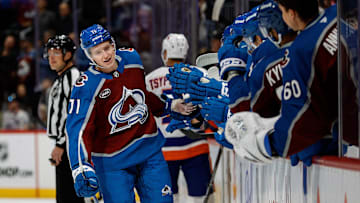 Oct 14, 2024; Denver, Colorado, USA; Colorado Avalanche center Calum Ritchie (71) celebrates with the bench after his goal in the first period against the New York Islanders at Ball Arena. Mandatory Credit: Isaiah J. Downing-Imagn Images