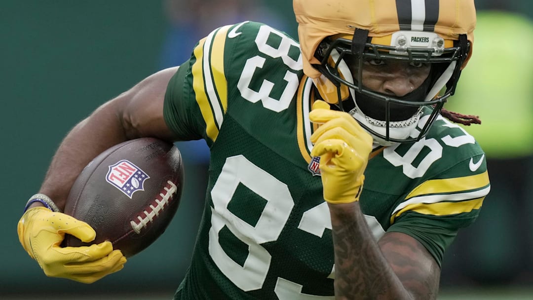 Green Bay Packers wide receiver Savion Williams (83) returns a punt during the third quarter of their game against the Minnesota Vikings Sunday, November 23, 2025, at Lambeau Field in Green Bay, Wisconsin.