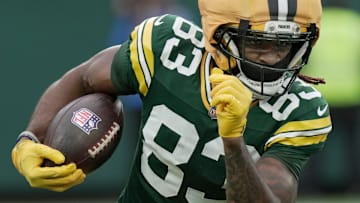 Green Bay Packers wide receiver Savion Williams (83) returns a punt during the third quarter of their game against the Minnesota Vikings Sunday, November 23, 2025, at Lambeau Field in Green Bay, Wisconsin.