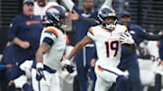 Dec 7, 2025; Paradise, Nevada, USA;  Denver Broncos wide receiver Marvin Mims Jr. (19) returns a punt for a touchdown against the Las Vegas Raiders during the first half at Allegiant Stadium. Mandatory Credit: Kirby Lee-Imagn Images
