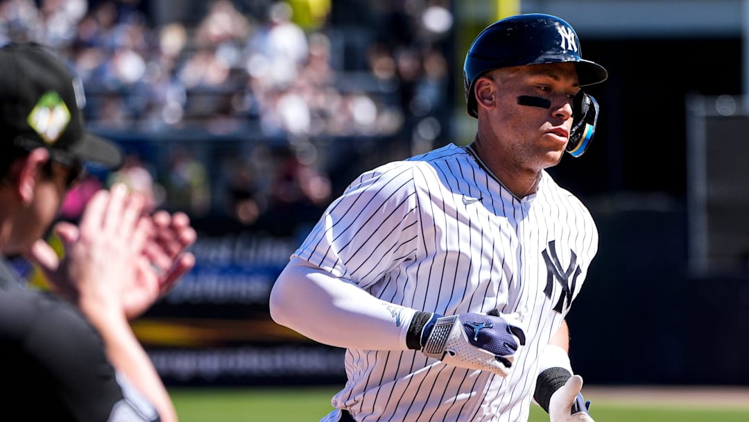 New York Yankees right fielder Aaron Judge (99) bats a 2-run home run against Detroit Tigers during the third inning at George M. Steinbrenner Field in Tampa, Fla. on Saturday, Feb. 21, 2026.