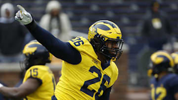 Apr 1, 2023; Ann Arbor, MI, USA; Michigan Wolverines defensive lineman Rayshaun Benny (26) celebrates during the Spring Game at Michigan Stadium. Mandatory Credit: Rick Osentoski-Imagn Images
