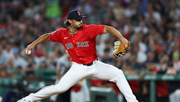 Jul 2, 2025; Boston, Massachusetts, USA; Boston Red Sox relief pitcher Jordan Hicks (46) delivers a pitch during the seventh inning against the Cincinnati Reds at Fenway Park. Mandatory Credit: Paul Rutherford-Imagn Images