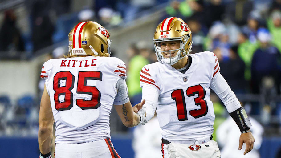 San Francisco 49ers quarterback Brock Purdy (13) celebrates with tight end George Kittle. | Joe Nicholson-Imagn Images