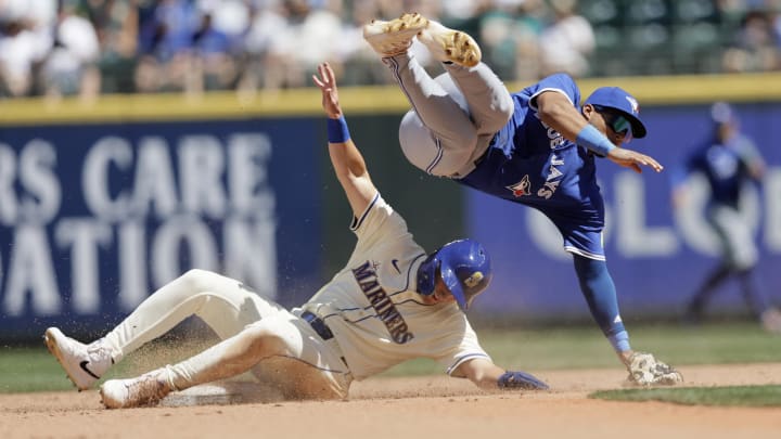 Seattle Mariners right fielder Dominic Canzone is called safe at second against the Toronto Blue Jays on July 7 at T-Mobile Park.