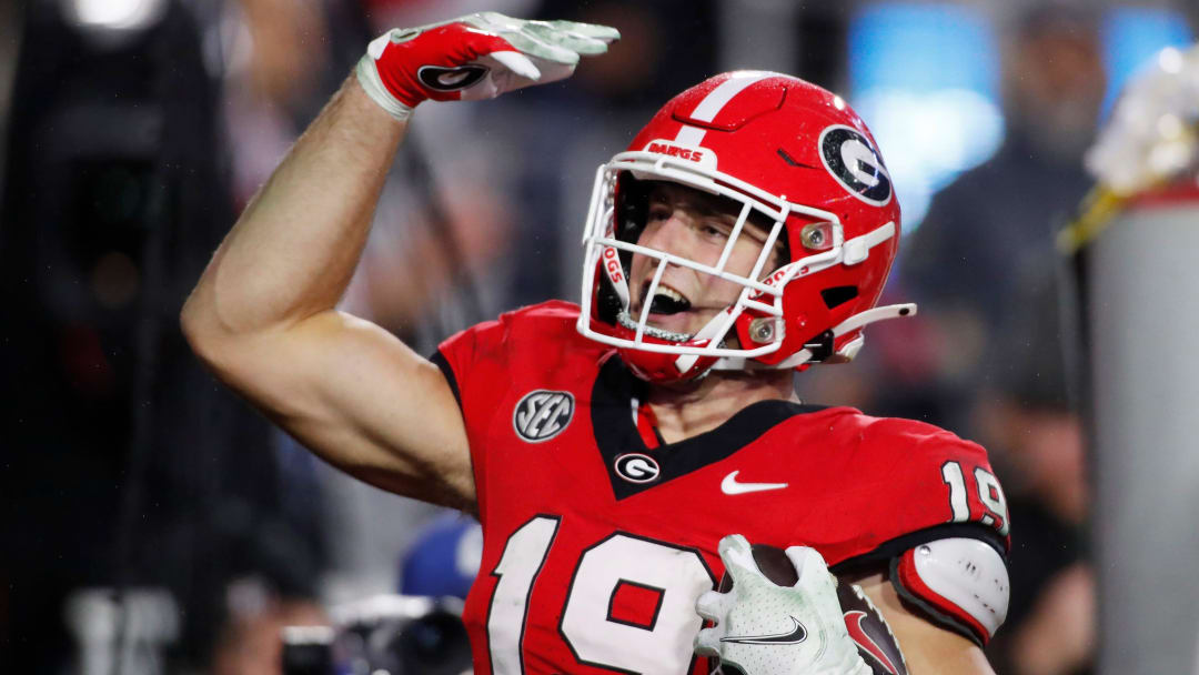 Georgia tight end Brock Bowers (19) celebrates after scoring a touchdown during the second half of a NCAA college football game against Ole Miss in Athens, Ga., on Saturday, Nov. 11, 2023. Georgia won 52-17.