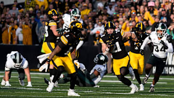 Iowa Hawkeyes wide receiver Kaden Wetjen (21) returns a punt to the endzone against the Michigan State Spartans Nov. 22, 2025 at Kinnick Stadium in Iowa City, Iowa.