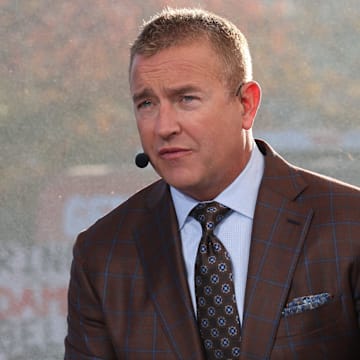 Analyst Kirk Herbstreit speaks during the ESPN College GameDay live broadcast on the Texas Tech University campus