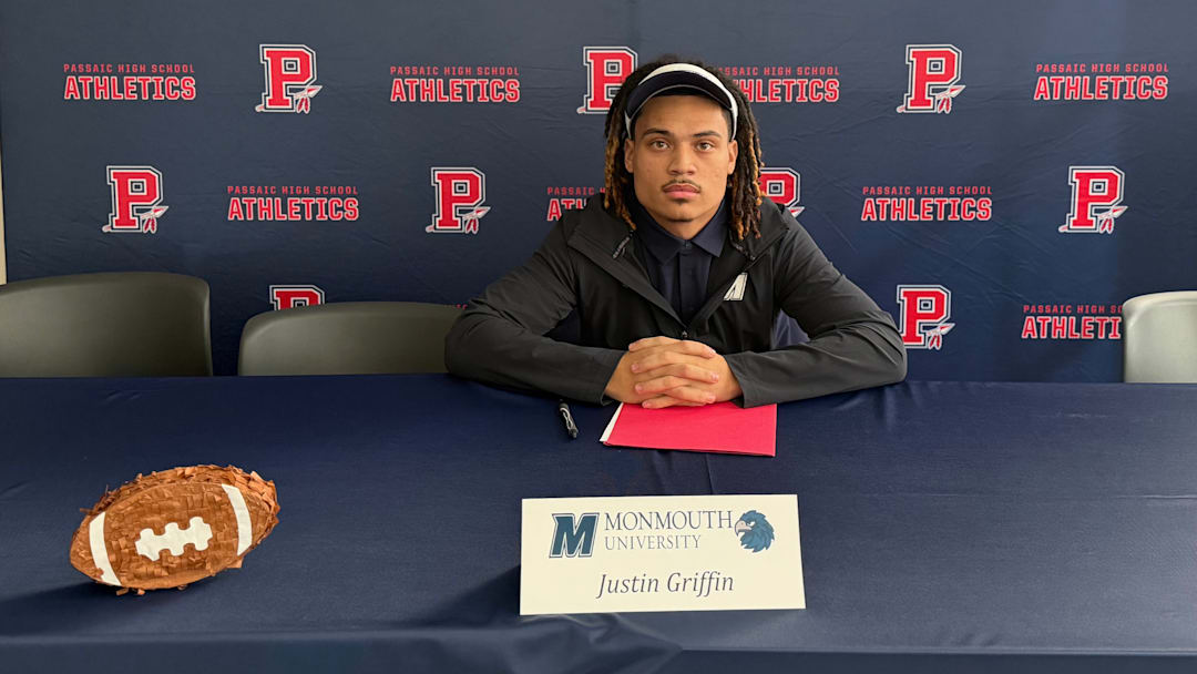 Justin Griffin signs his National Letter of Intent to play college football at Monmouth University.