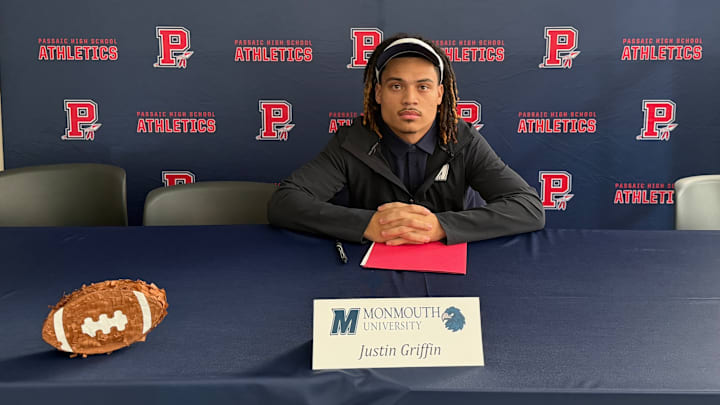 Justin Griffin signs his National Letter of Intent to play college football at Monmouth University.
