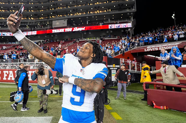 Lions wide receiver Jameson Williams takes a selfie to celebrate 40-34 win over San Francisco.