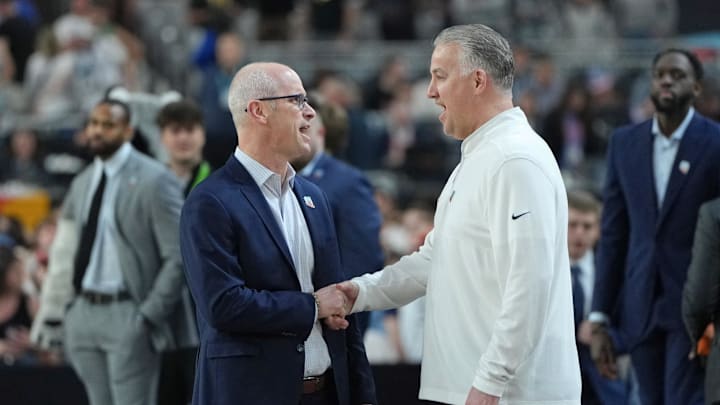 Apr 8, 2024; Glendale, AZ, USA; Connecticut Huskies head coach Dan Hurley shakes hands with Purdue Boilermakers head coach Matt Painter before the national championship game of the Final Four of the 2024 NCAA Tournament between the Connecticut Huskies and the Purdue Boilermakers at State Farm Stadium. Mandatory Credit: Bob Donnan-Imagn Images