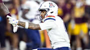 Nov 28, 2025; Tempe, Arizona, USA; Arizona Wildcats wide receiver Kris Hutson (4) celebrates a first down against the Arizona State Sun Devils in the first half during the 99th Territorial Cup at Mountain America Stadium. Mandatory Credit: Mark J. Rebilas-Imagn Images