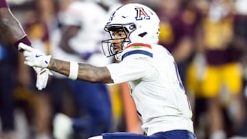 Nov 28, 2025; Tempe, Arizona, USA; Arizona Wildcats wide receiver Kris Hutson (4) celebrates a first down against the Arizona State Sun Devils in the first half during the 99th Territorial Cup at Mountain America Stadium. Mandatory Credit: Mark J. Rebilas-Imagn Images