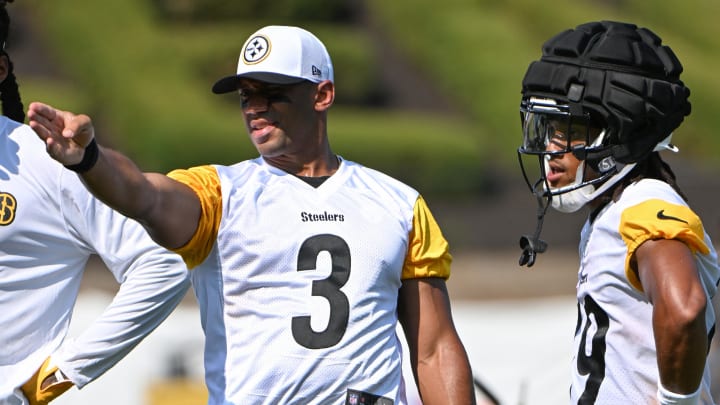 Jul 28, 2024; Latrobe, PA, USA; Pittsburgh Steelers quarterback Russell Wilson (3) talks to wide receiver Calvin Austin III (19) during training camp at Saint Vincent College. Mandatory Credit: Barry Reeger-USA TODAY Sports