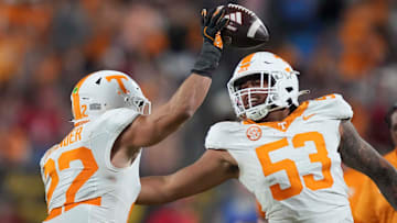 Tennessee linebacker Jeremiah Telander (22) and Tennessee defensive lineman Daevin Hobbs (53) celebrate a fumble recovery at the NCAA College football game between Tennessee and NC State on Saturday, Sept. 7, 2024 in Charlotte, NC.