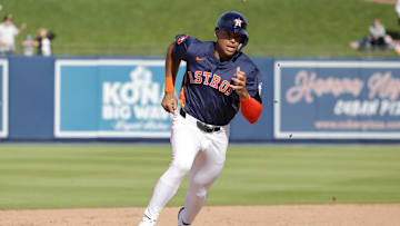 Houston Astros infielder Cam Smith rounds second base