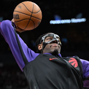Mar 28, 2025; Toronto, Ontario, CAN; Toronto Raptors forward Jonathan Mogbo (2) warms up before playing the Charlotte Hornets at Scotiabank Arena. Mandatory Credit: Dan Hamilton-Imagn Images
