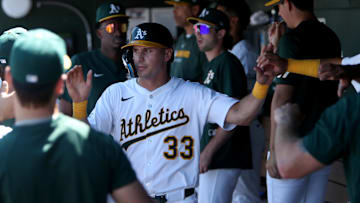 Aug 3, 2025; West Sacramento, California, USA; Athletics left fielder JJ Bleday (33) celebrates with teammates after scoring a run against the Arizona Diamondbacks during the seventh inning at Sutter Health Park. Mandatory Credit: Dennis Lee-Imagn Images
