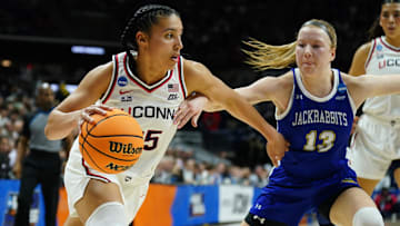 Mar 24, 2025; Storrs, Connecticut, USA; UConn Huskies guard Azzi Fudd (35) drives the ball against South Dakota State Jackrabbits guard Haleigh Timmer (13) in the first half at Harry A. Gampel Pavilion. Mandatory Credit: David Butler II-Imagn Images