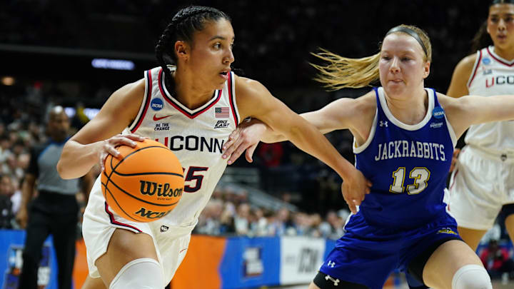 Mar 24, 2025; Storrs, Connecticut, USA; UConn Huskies guard Azzi Fudd (35) drives the ball against South Dakota State Jackrabbits guard Haleigh Timmer (13) in the first half at Harry A. Gampel Pavilion. Mandatory Credit: David Butler II-Imagn Images