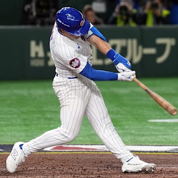 Chicago Cubs third baseman Matt Shaw hits an RBI single against the Yomiuri Giants during the fifth inning at Tokyo Dome.
