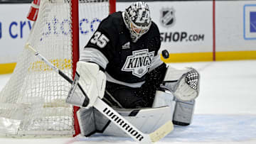 Apr 12, 2025; Los Angeles, California, USA; Los Angeles Kings goaltender Darcy Kuemper (35) makes a save during the third period against the Colorado Avalanche at Crypto.com Arena. Mandatory Credit: Jayne Kamin-Oncea-Imagn Images