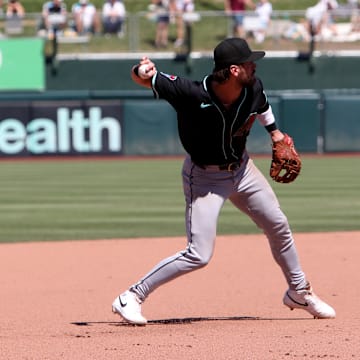 Aug 3, 2025; West Sacramento, California, USA; Arizona Diamondbacks third baseman Blaze Alexander (9) throws to first base for an out against the Athletics during the seventh inning at Sutter Health Park. Mandatory Credit: Dennis Lee-Imagn Images