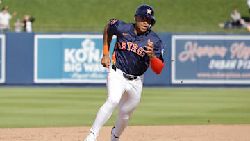 Feb 22, 2025; West Palm Beach, Florida, USA; Houston Astros infielder Cam Smith rounds second base in the ninth inning against the Washington Nationals at CACTI Park of the Palm Beaches.