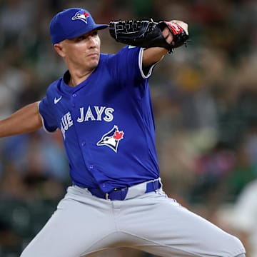 Jul 12, 2025; West Sacramento, California, USA; Toronto Blue Jays pitcher Chad Green (57) throws a pitch against the Athletics during the eighth inning at Sutter Health Park. Mandatory Credit: Dennis Lee-Imagn Images
