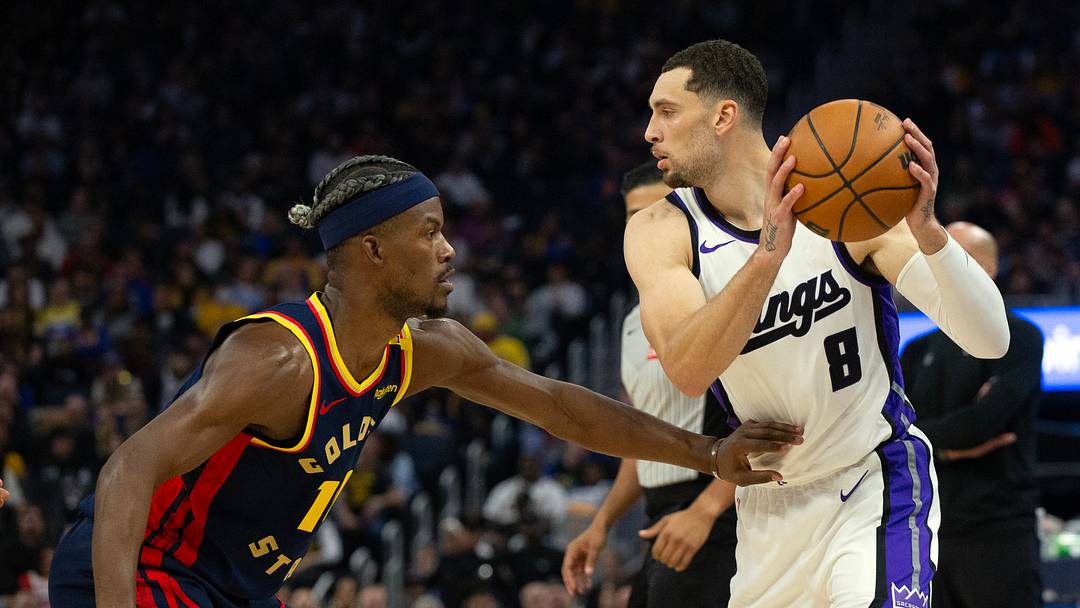 Mar 13, 2025; San Francisco, California, USA; Sacramento Kings guard Zach LaVine (8) looks to pass around Golden State Warriors forward Jimmy Butler III (10) during the second quarter at Chase Center. Mar 13, 2025; San Francisco, California, USA; Sacramento Kings guard Zach LaVine (8) looks to pass around Golden State Warriors forward Jimmy Butler III (10) during the second quarter at Chase Center.