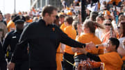 Tennessee head coach Josh Heupel greets fans during the Vol Walk ahead of the NCAA college football
