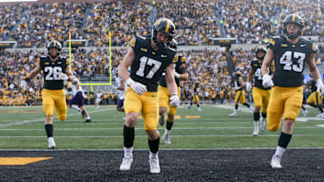 Iowa’s Alex Eichmann (17) and other Hawkeyes race to the ball after a kickoff to Northwestern Saturday, Oct. 26, 2024 at Kinnick Stadium in Iowa City, Iowa.