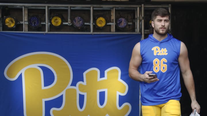 Nov 4, 2023; Pittsburgh, Pennsylvania, USA;  Pittsburgh Panthers tight end Gavin Bartholomew (86) takes the field to warm up before the game against the Florida State Seminoles at Acrisure Stadium. Mandatory Credit: Charles LeClaire-USA TODAY Sports