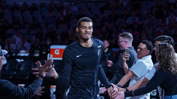 Nov 30, 2023; San Antonio, Texas, USA; San Antonio Spurs power forward Victor Wembanyama (1) is introduced before the game against the Atlanta Hawks at the Frost Bank Center. 