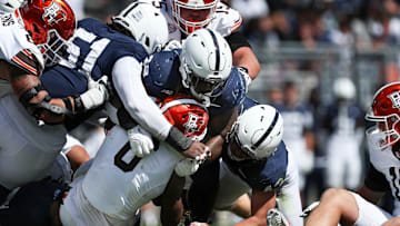 Penn State Nittany Lions defensive tackle Zane Durant (28) tackles Bowling Green Falcons tight end Harold Fannin Jr. (0) during the fourth quarter at Beaver Stadium.