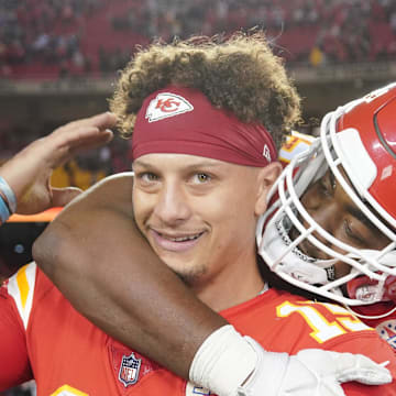 Nov 6, 2022; Kansas City, Missouri, USA; Kansas City Chiefs defensive tackle Chris Jones (95) celebrates with quarterback Patrick Mahomes (15) after the win over the Tennessee Titans at GEHA Field at Arrowhead Stadium. Mandatory Credit: Denny Medley-Imagn Images