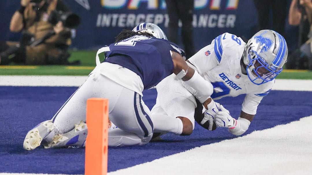 Oct 13, 2024; Arlington, Texas, USA; Detroit Lions wide receiver Jameson Williams (9) catches a touchdown pass past Dallas Cowboys cornerback Trevon Diggs (7) during the second half at AT&T Stadium. Mandatory Credit: Kevin Jairaj-Imagn Images Oct 13, 2024; Arlington, Texas, USA; Detroit Lions wide receiver Jameson Williams (9) catches a touchdown pass past Dallas Cowboys cornerback Trevon Diggs (7) during the second half at AT&T Stadium. Mandatory Credit: Kevin Jairaj-Imagn Images