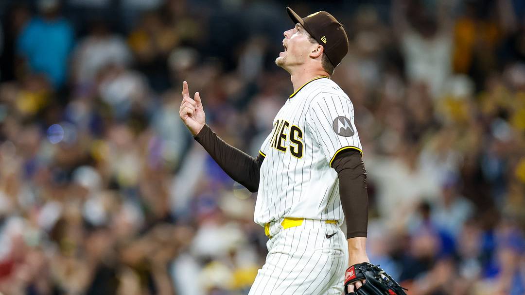 San Diego Padres relief pitcher Mason Miller (22) celebrates after defeating the Toronto Blue Jays at Petco Park on July 11, 2026.