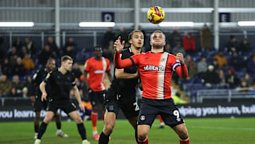 Ashley Phillips marking Luton Town's Carlton Morris on Tuesdays night