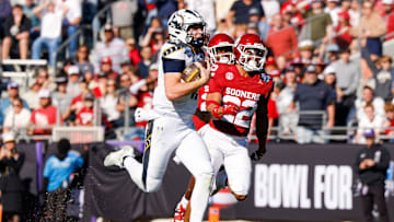 Navy quarterback Blake Horvath broke loose for a 95-yard touchdown run in the Armed Forces Bowl against Oklahoma.