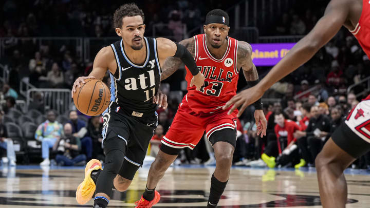 Feb 12, 2024; Atlanta, Georgia, USA; Atlanta Hawks guard Trae Young (11) dribbles against the Chicago Bulls during the first half at State Farm Arena. Mandatory Credit: Dale Zanine-USA TODAY Sports