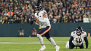 Jan 7, 2024; Green Bay, Wisconsin, USA;  Chicago Bears quarterback Justin Fields (1) looks to throw
